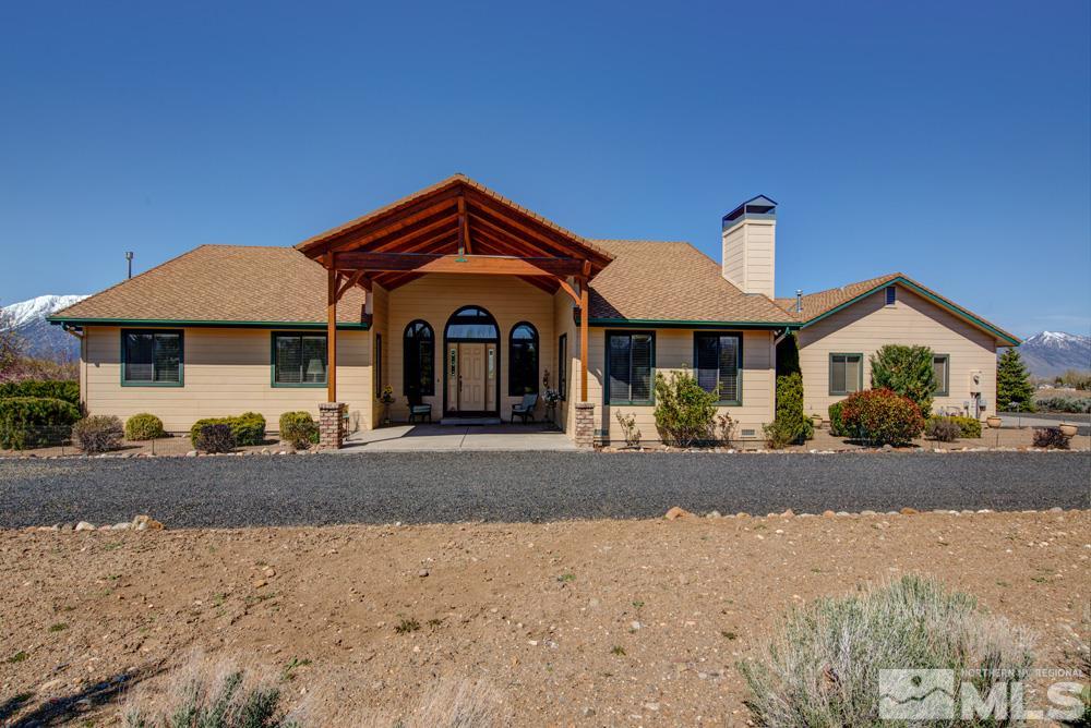1474 Sanchez Road Gardnerville, NV 89410 - Photo 1 of 1 a front view of a house with a yard