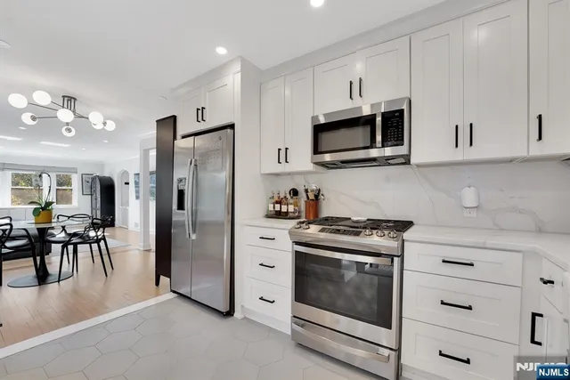 a view of living room with furniture and window
