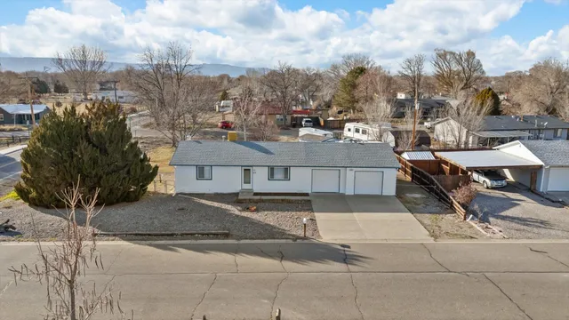 a view of a street in front of a building