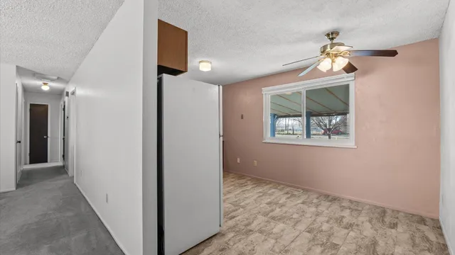 a view of a hallway with front door