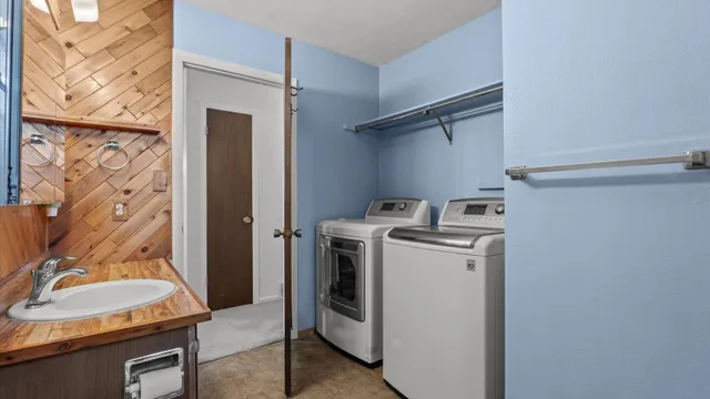 a utility room with dryer and washer
