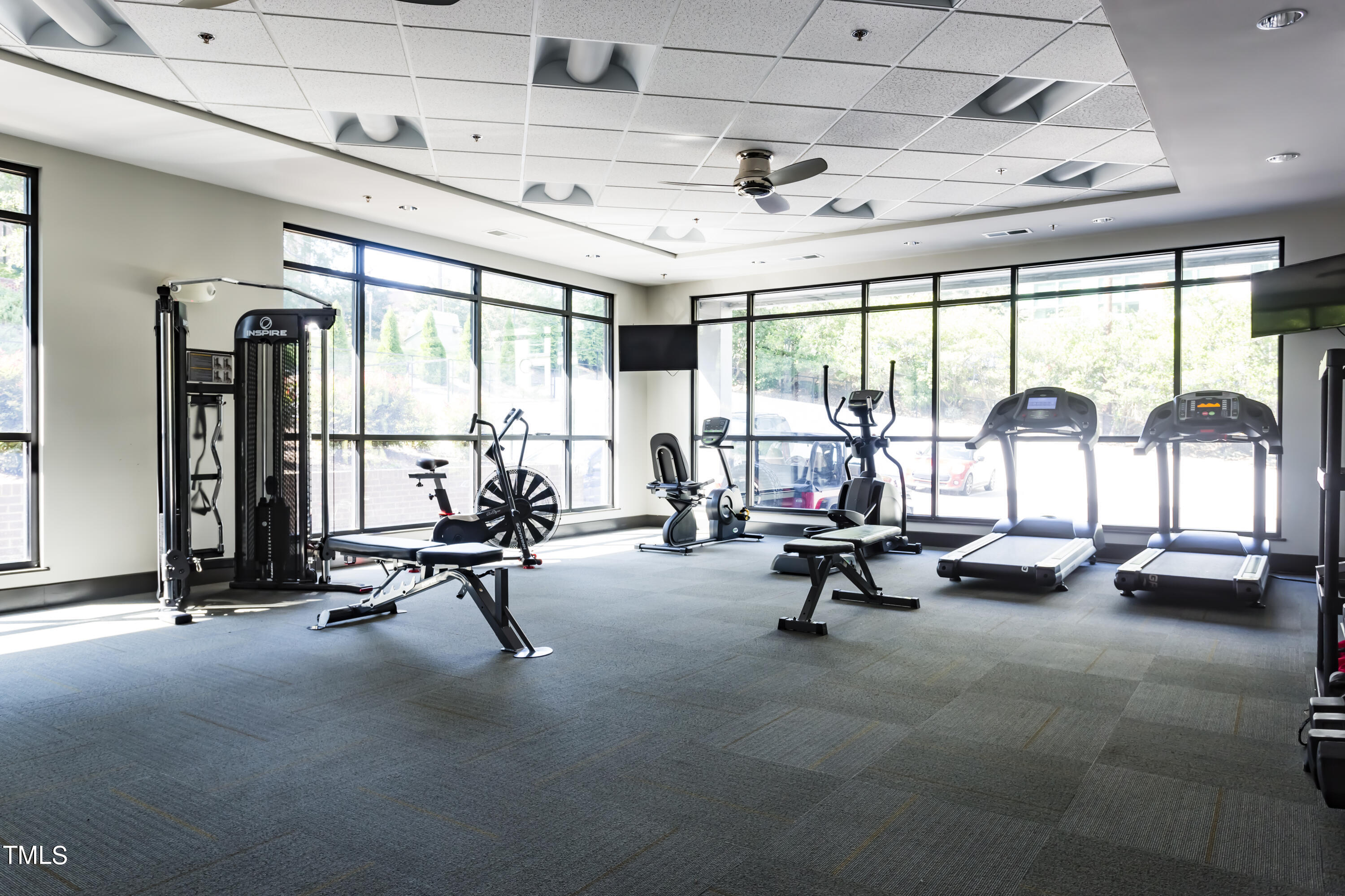 1300 St Marys Street, Unit 301 Raleigh, NC 27605 - Photo 19 of 27 a view of a room with gym equipment