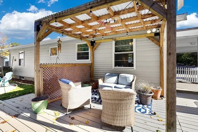 a view of a patio on the deck front of house