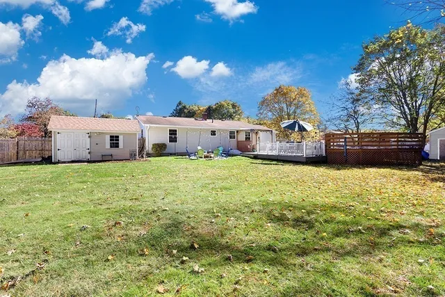 a view of a house with a big yard