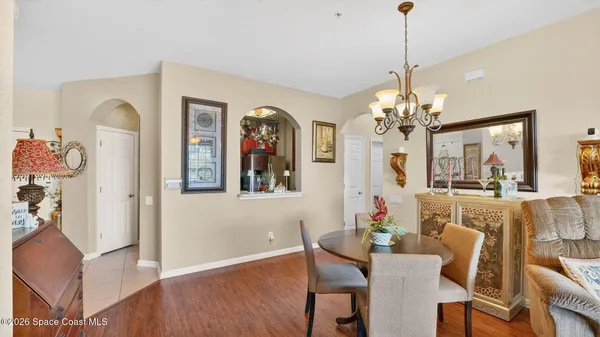 a kitchen with stainless steel appliances granite countertop a stove and a microwave