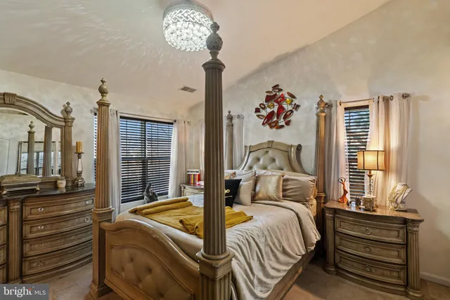 a bathroom with a sink double vanity and a mirror