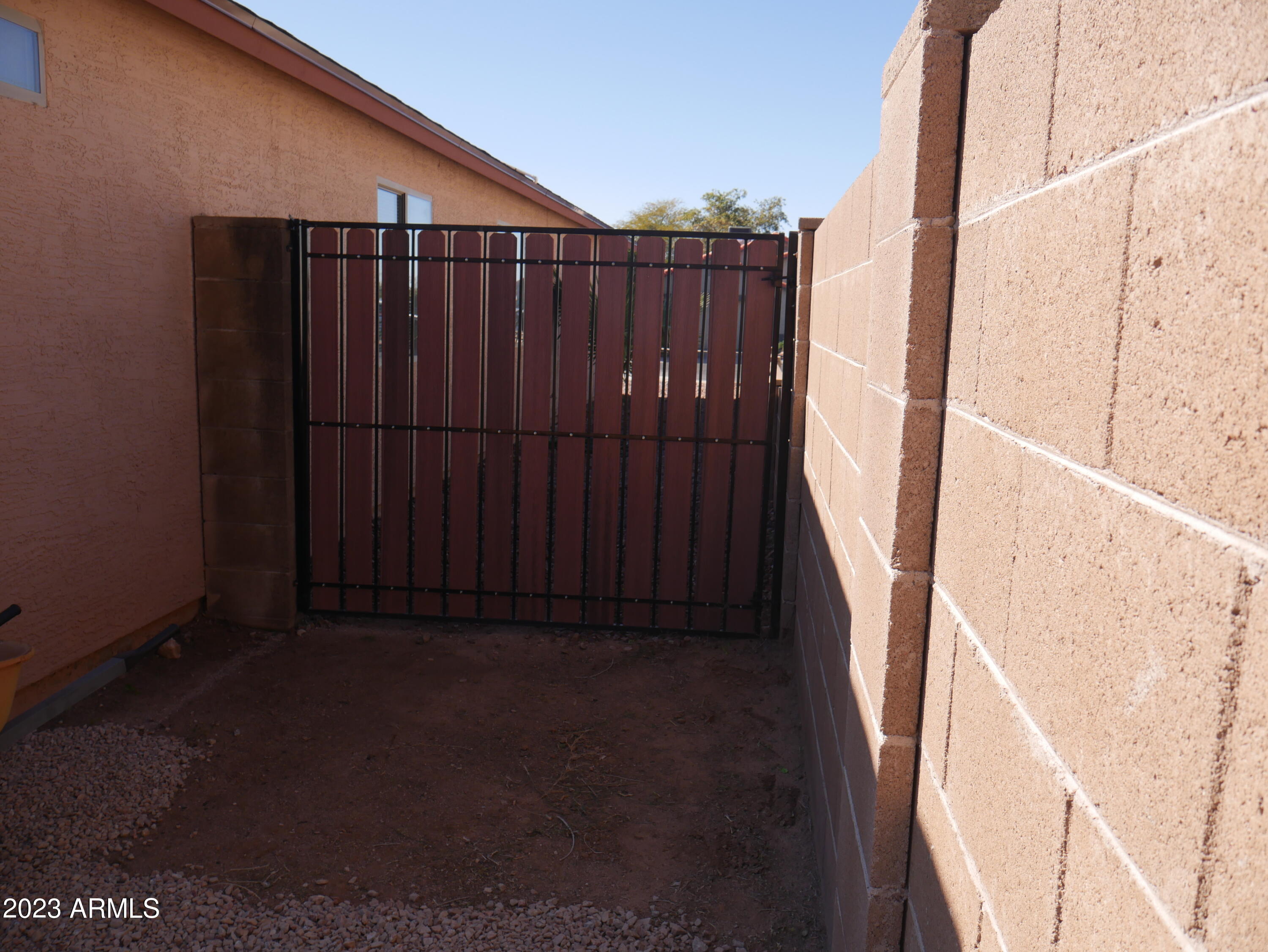 697 South Del Rio Court Apache Junction, AZ 85119 - Photo 27 of 33 RV gate