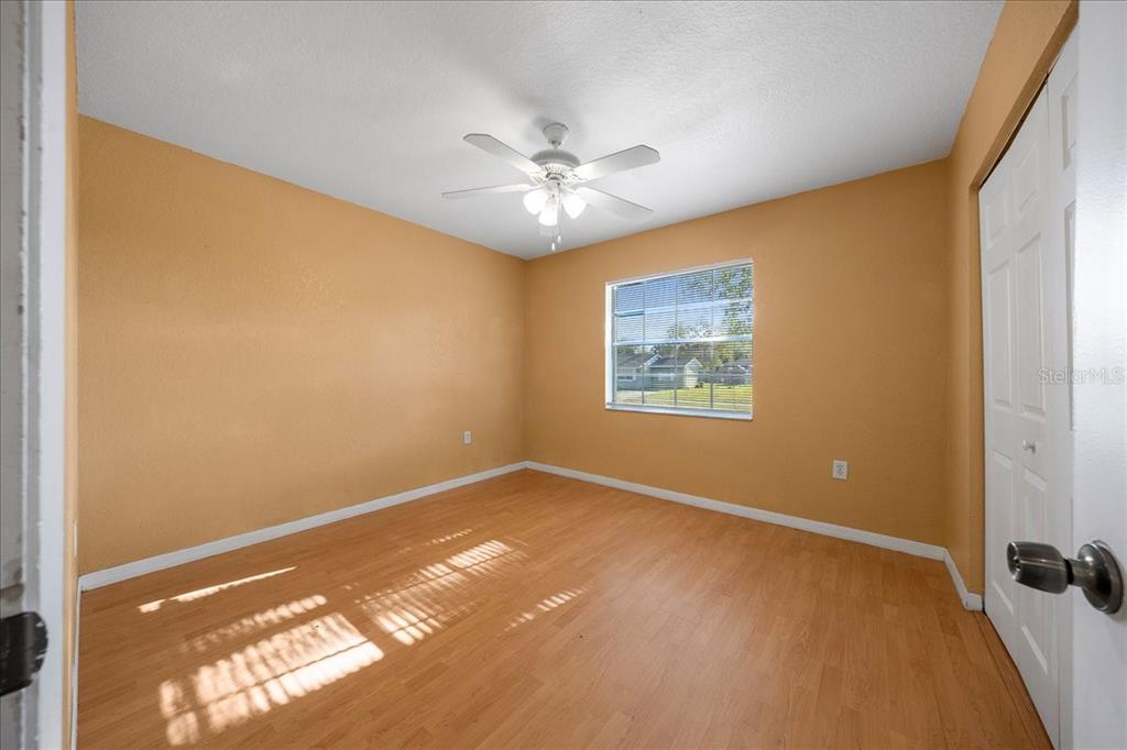 14906 Southwest 38th Circle Ocala, FL 34473 - Photo 13 of 24 a view of an empty room with a window