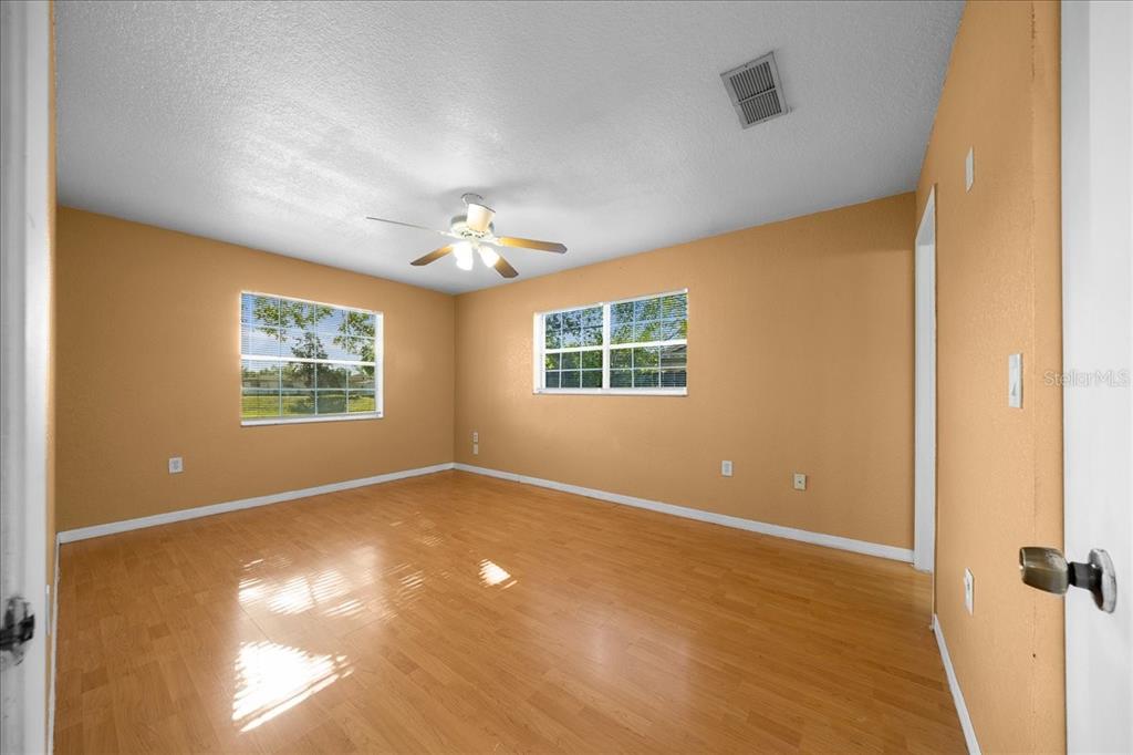 14906 Southwest 38th Circle Ocala, FL 34473 - Photo 9 of 24 a view of an empty room with a window