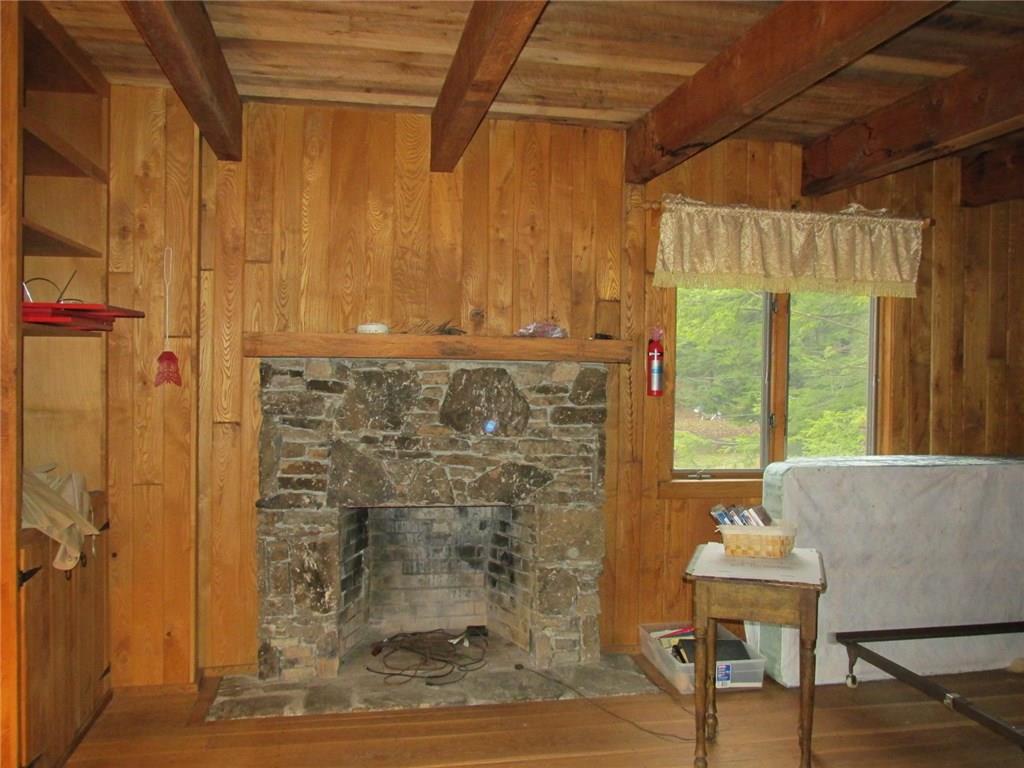 188 County Line Road Champion, PA 15622 - Photo 13 of 25 With its very own fireplace! The widow looks out to the ponds.