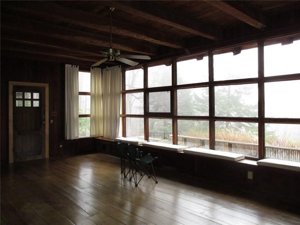 188 County Line Road Champion, PA 15622 - Photo 5 of 25 The door leads out to the patio. You will find two ceiling fans in the living room to keep the mountain air circulating!