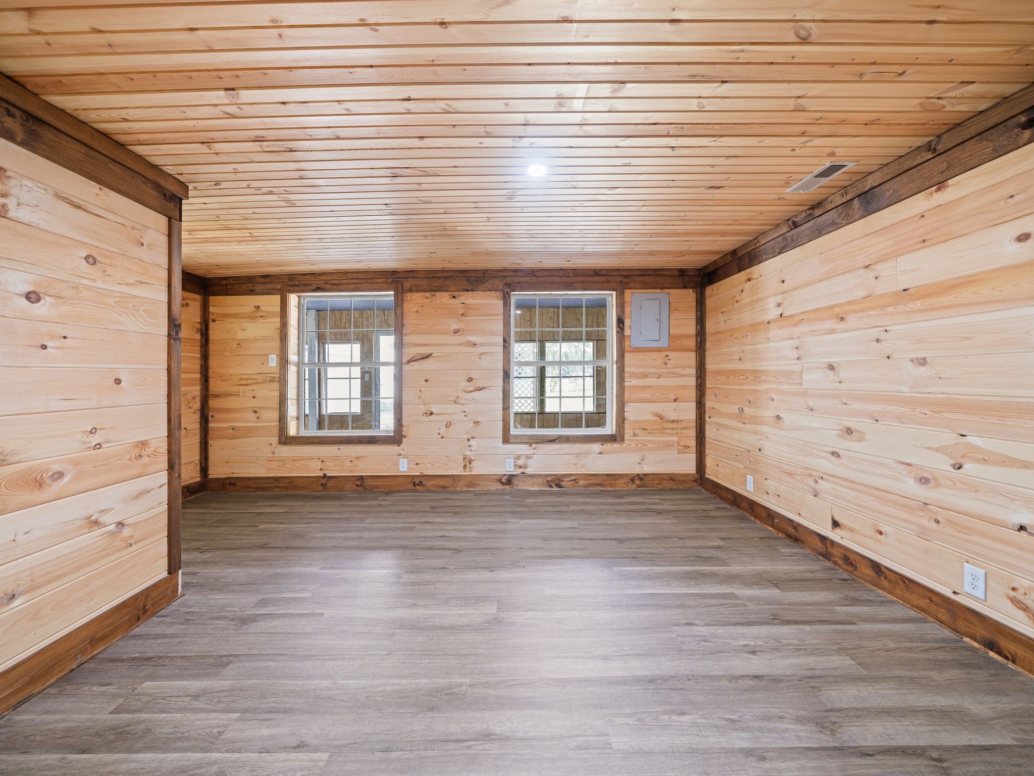 111 Brannon Circle Dickson, TN 37055 - Photo 11 of 34 a view of an empty room with a window and wooden floor
