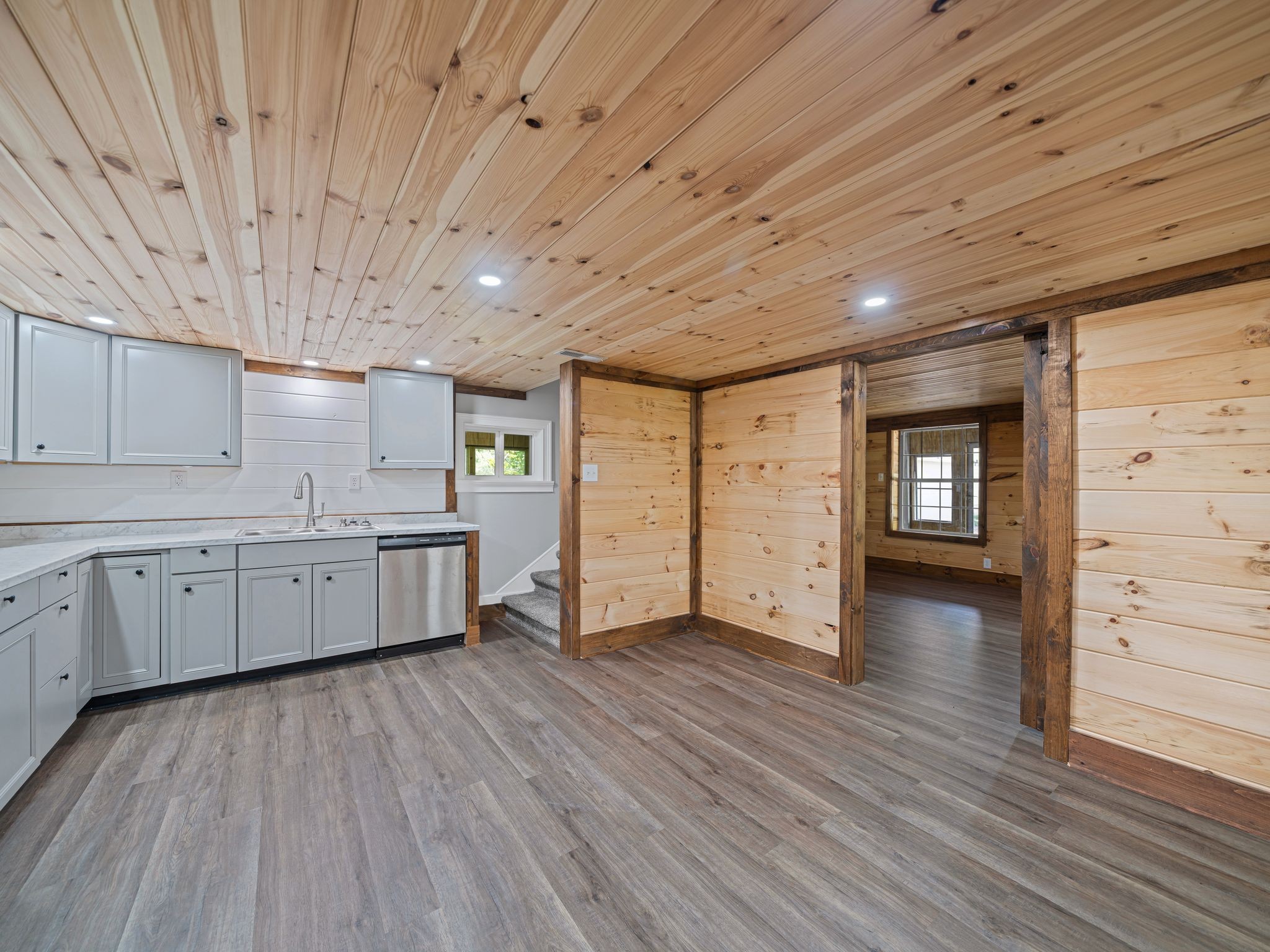 111 Brannon Circle Dickson, TN 37055 - Photo 13 of 34 a large kitchen with wooden floors and wooden floors