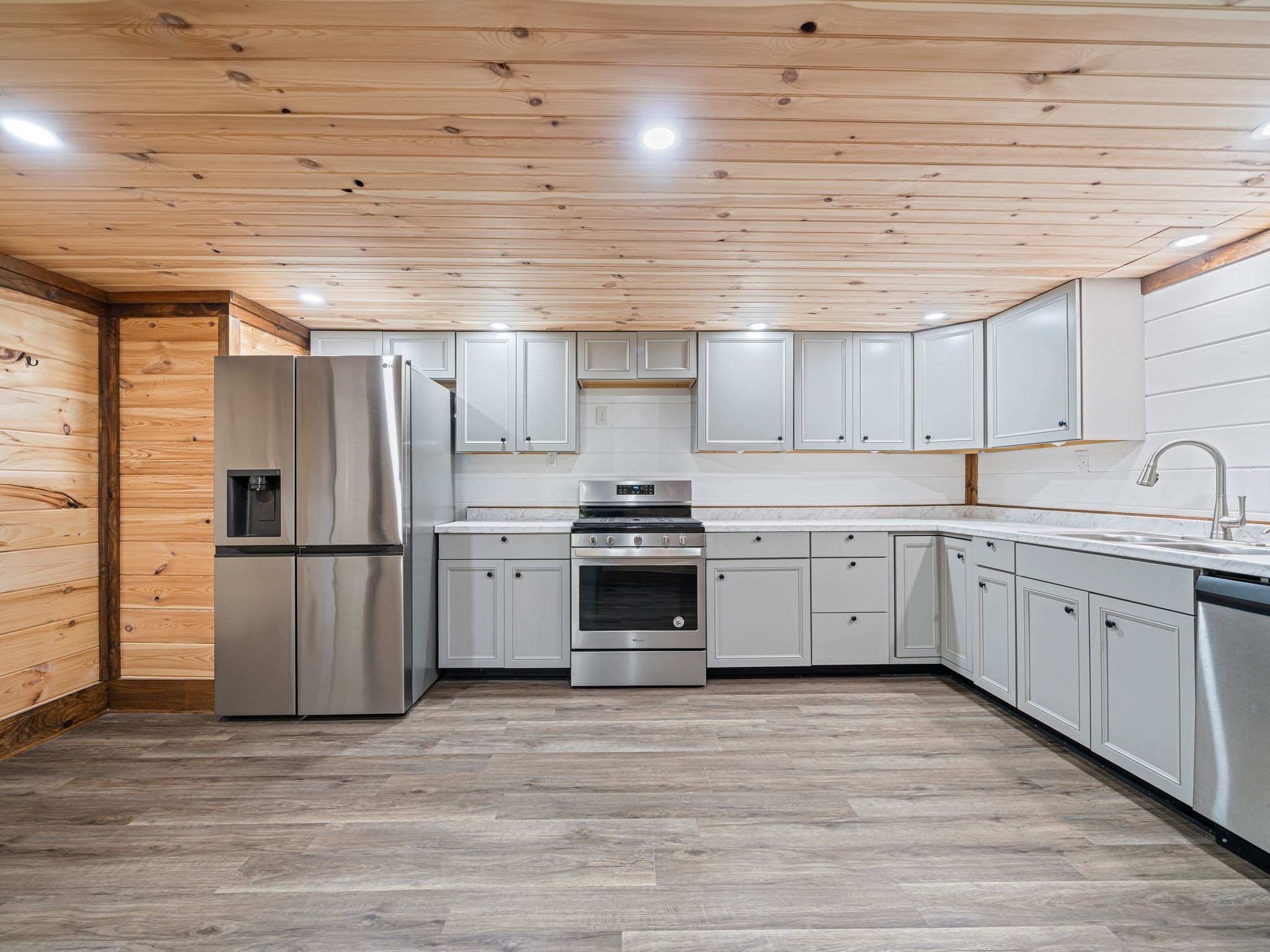 111 Brannon Circle Dickson, TN 37055 - Photo 16 of 34 a kitchen with a sink stainless steel appliances and cabinets