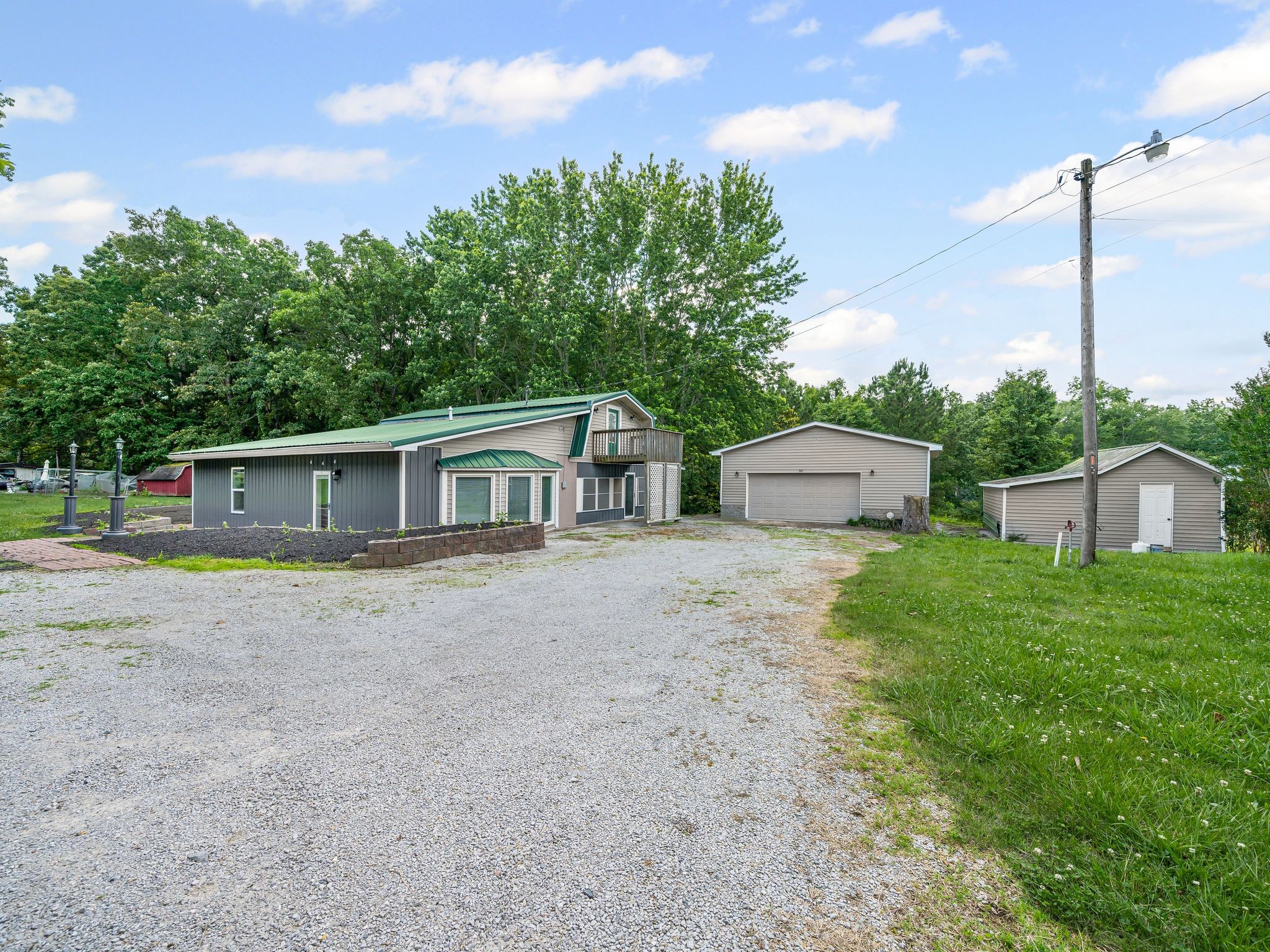 111 Brannon Circle Dickson, TN 37055 - Photo 2 of 34 a front view of a house with a yard and a garage