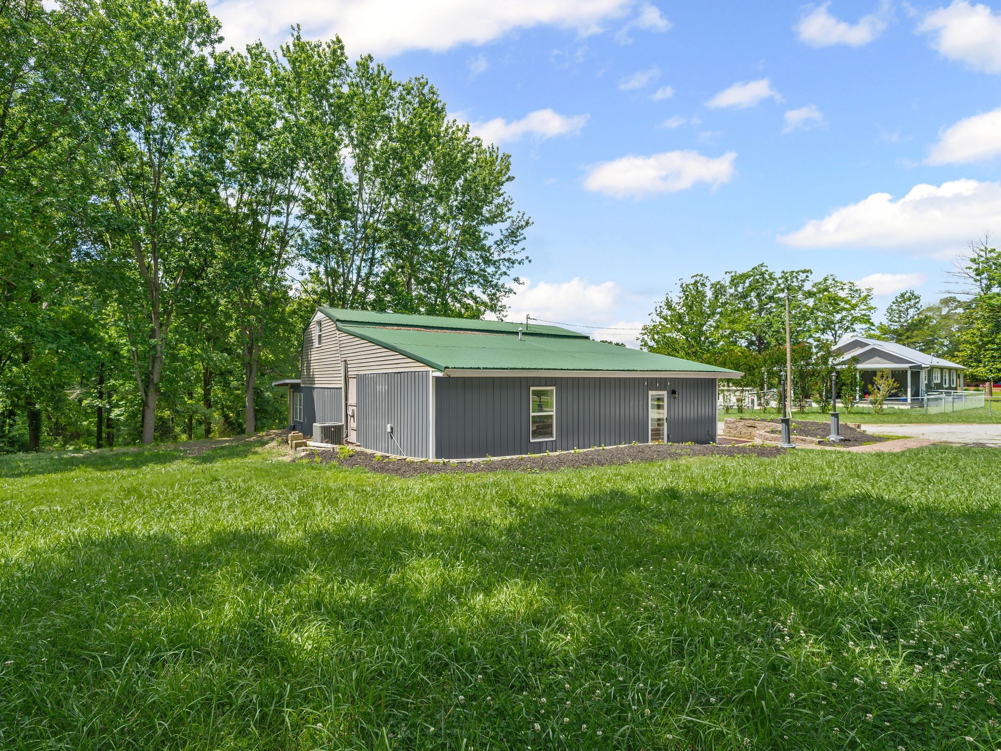 111 Brannon Circle Dickson, TN 37055 - Photo 30 of 34 a front view of house with yard and trees