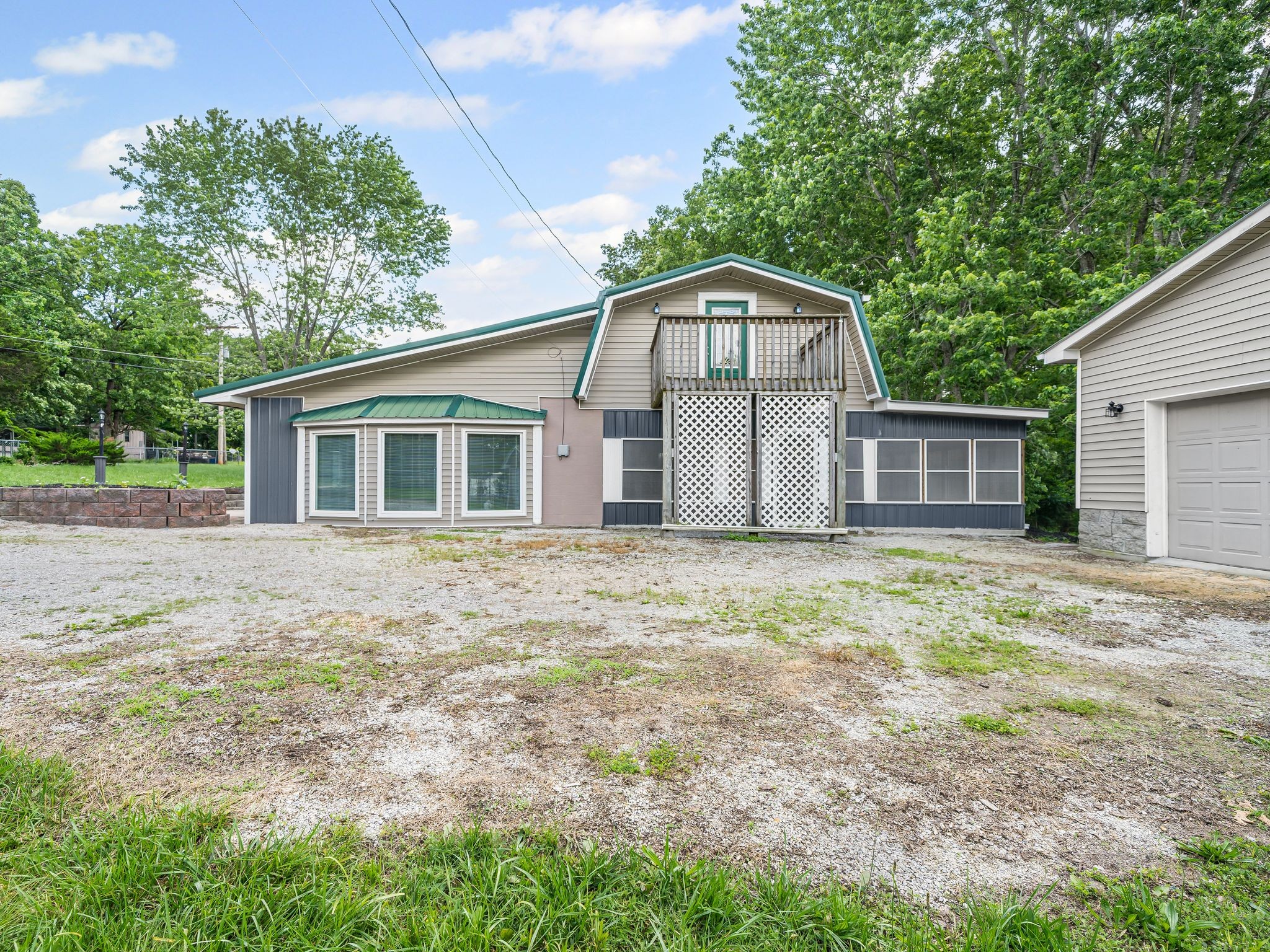 111 Brannon Circle Dickson, TN 37055 - Photo 3 of 34 a front view of a house with a garden