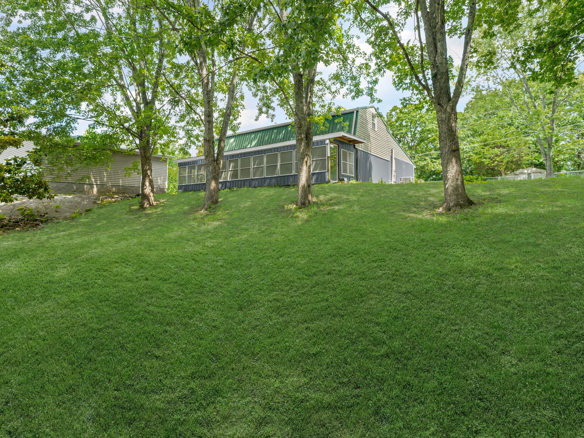 111 Brannon Circle Dickson, TN 37055 - Photo 32 of 34 a view of house with a backyard