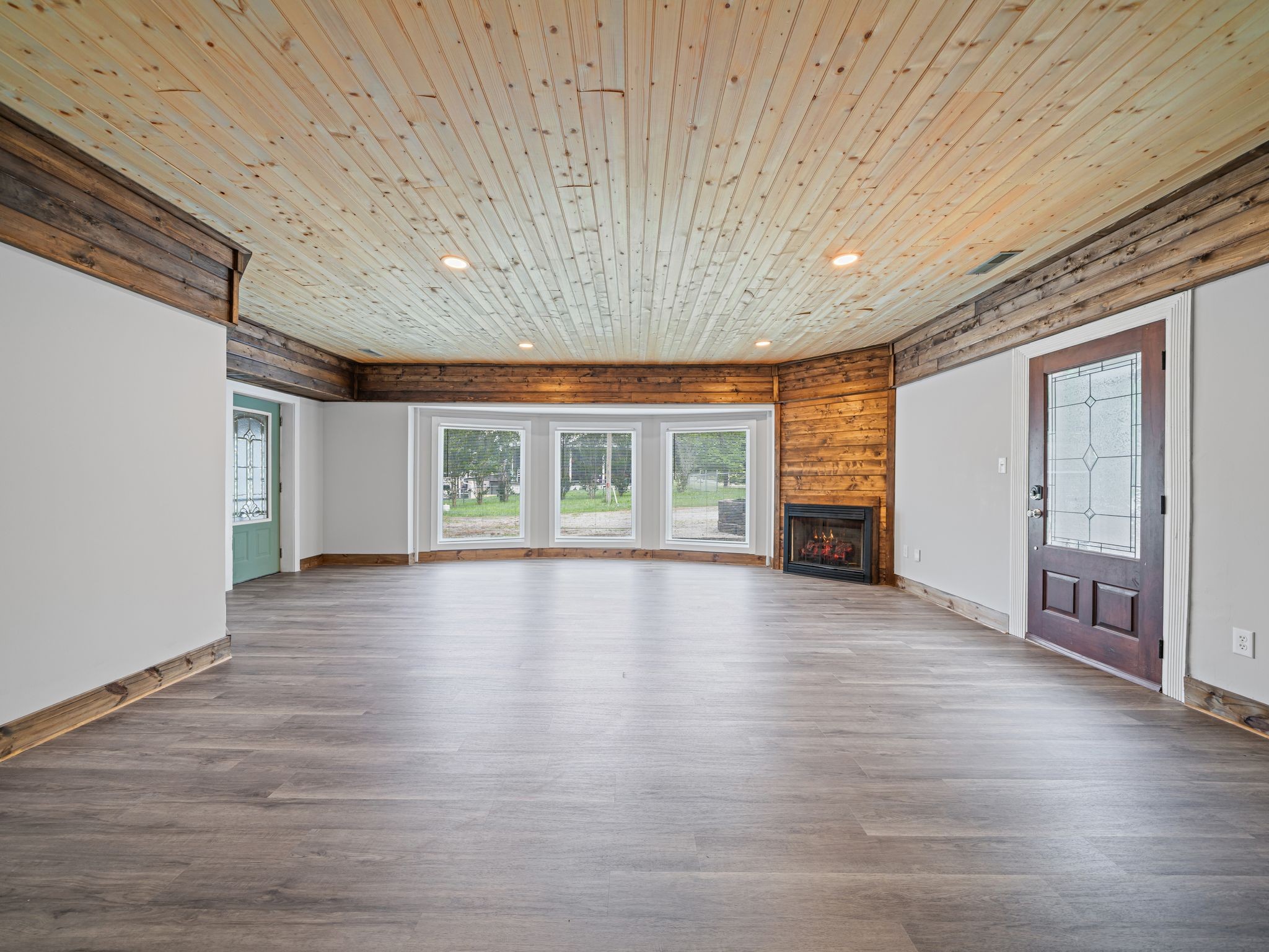 111 Brannon Circle Dickson, TN 37055 - Photo 5 of 34 an empty room with wooden floor and windows