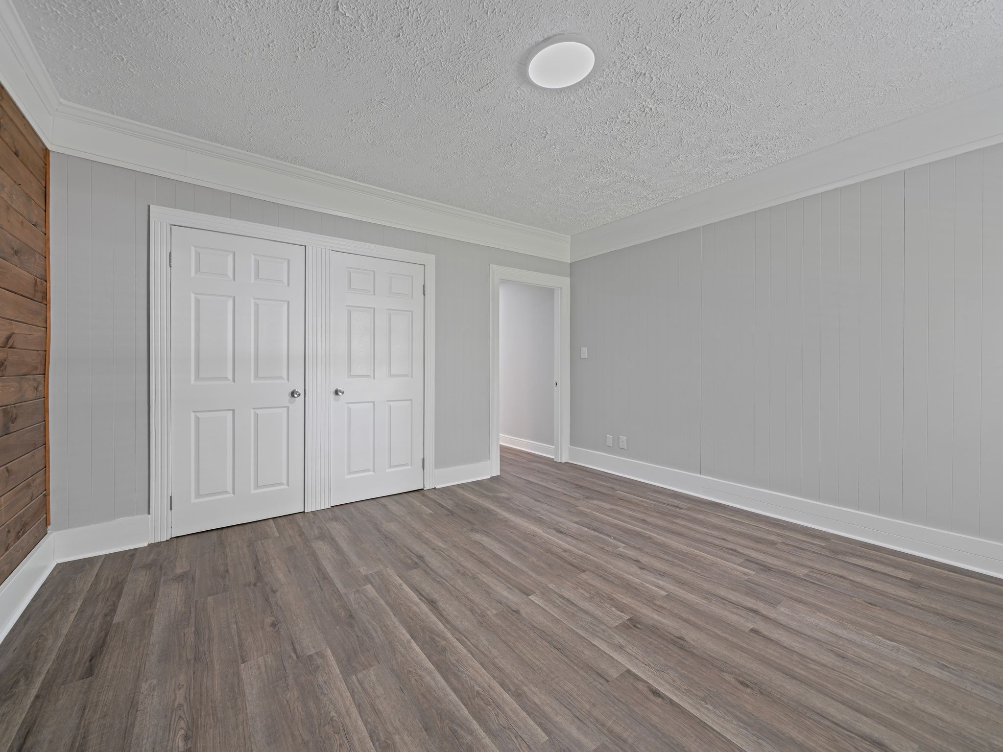 111 Brannon Circle Dickson, TN 37055 - Photo 8 of 34 a view of an empty room with wooden floor