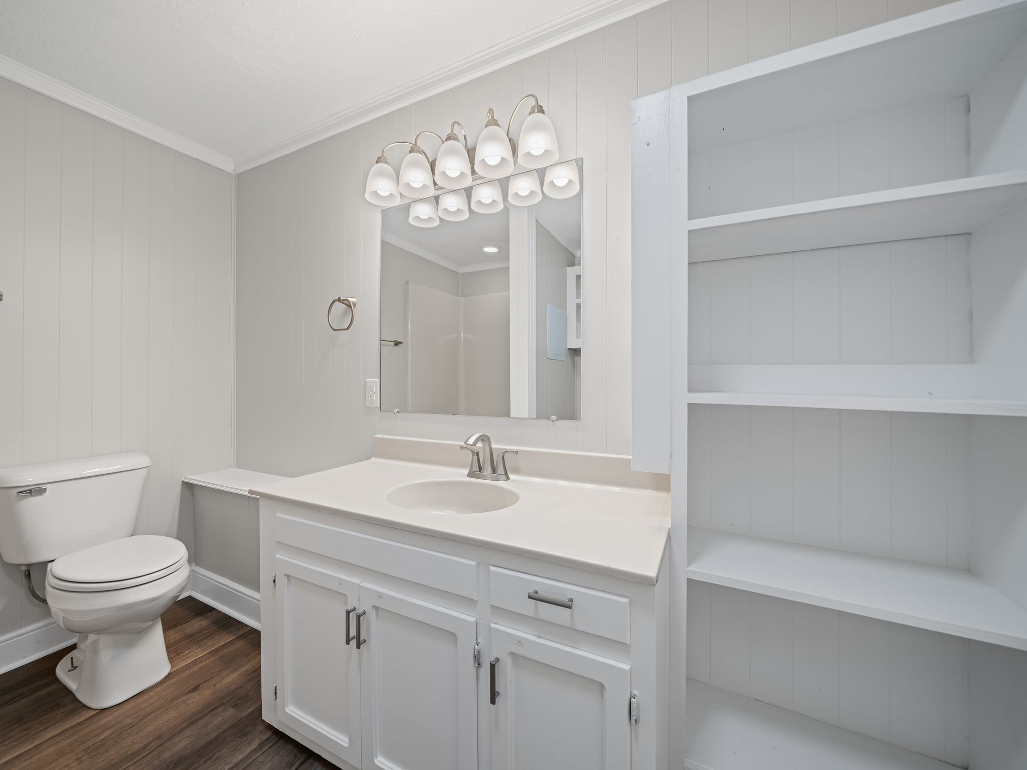 111 Brannon Circle Dickson, TN 37055 - Photo 9 of 34 a bathroom with a sink a toilet and a large mirror