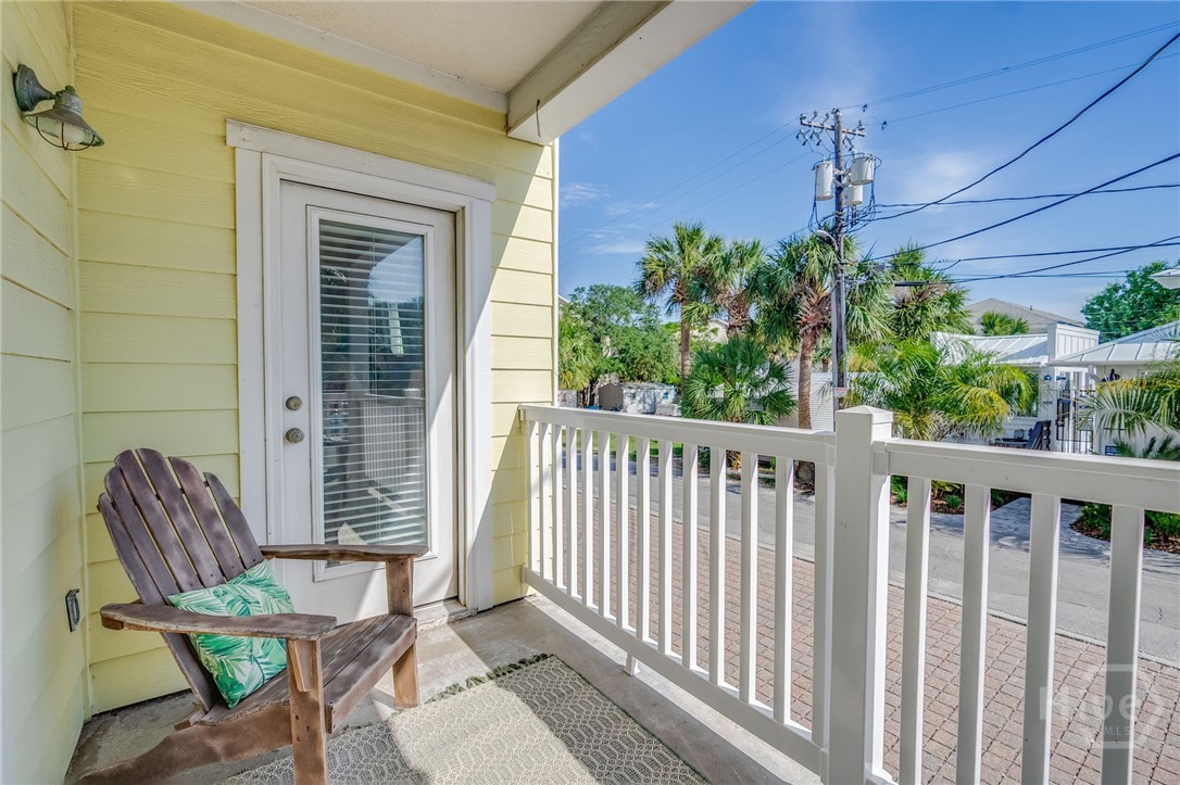 18 Silver Avenue, Unit 1 Tybee Island, GA 31328 - Photo 20 of 50 Porch w/Partial Oceanview & View of Southern Belle Pool Entrance