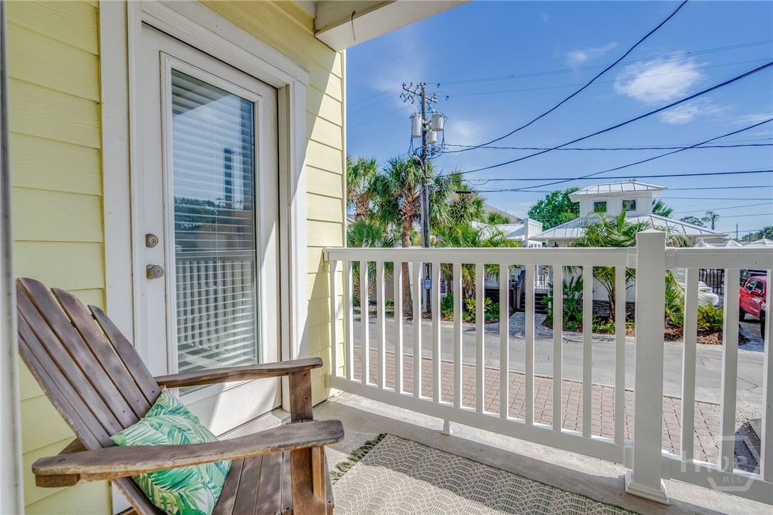 18 Silver Avenue, Unit 1 Tybee Island, GA 31328 - Photo 21 of 50 Porch w/Partial Oceanview & View of Southern Belle Pool Entrance