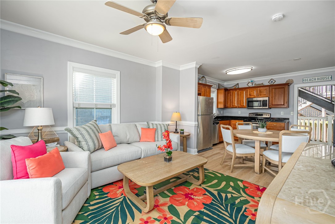 18 Silver Avenue, Unit 1 Tybee Island, GA 31328 - Photo 6 of 50 Living Room with Sliding Glass Door leading to Private Balcony with Partial Ocean View.