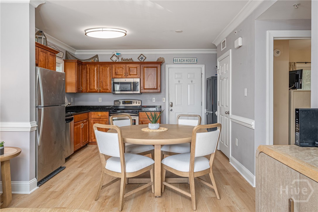 18 Silver Avenue, Unit 1 Tybee Island, GA 31328 - Photo 7 of 50 Kitchen w/Stainless Steel Appliances & Granite Countertops