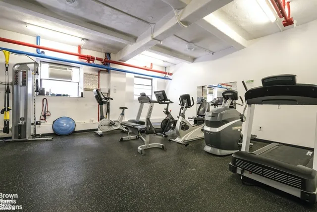 a view of a room with gym equipment