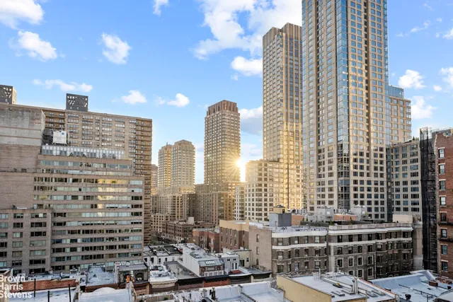 a view of a city with tall buildings