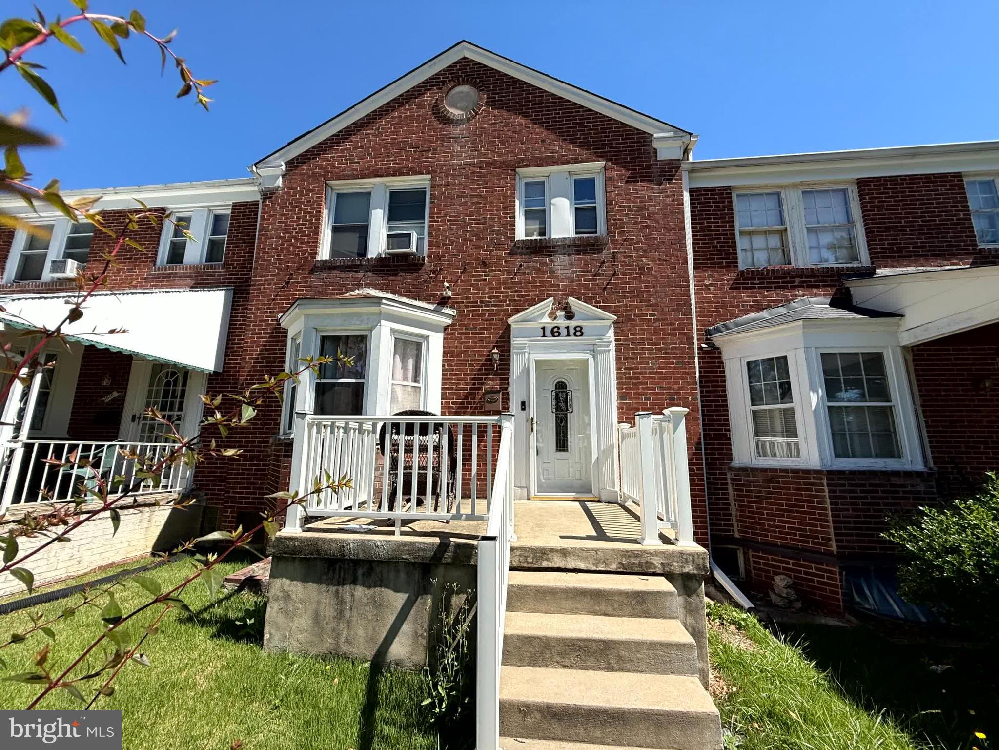 1618 Roundhill Road Baltimore, MD 21218 - Photo 49 of 50 a front view of a house with a yard