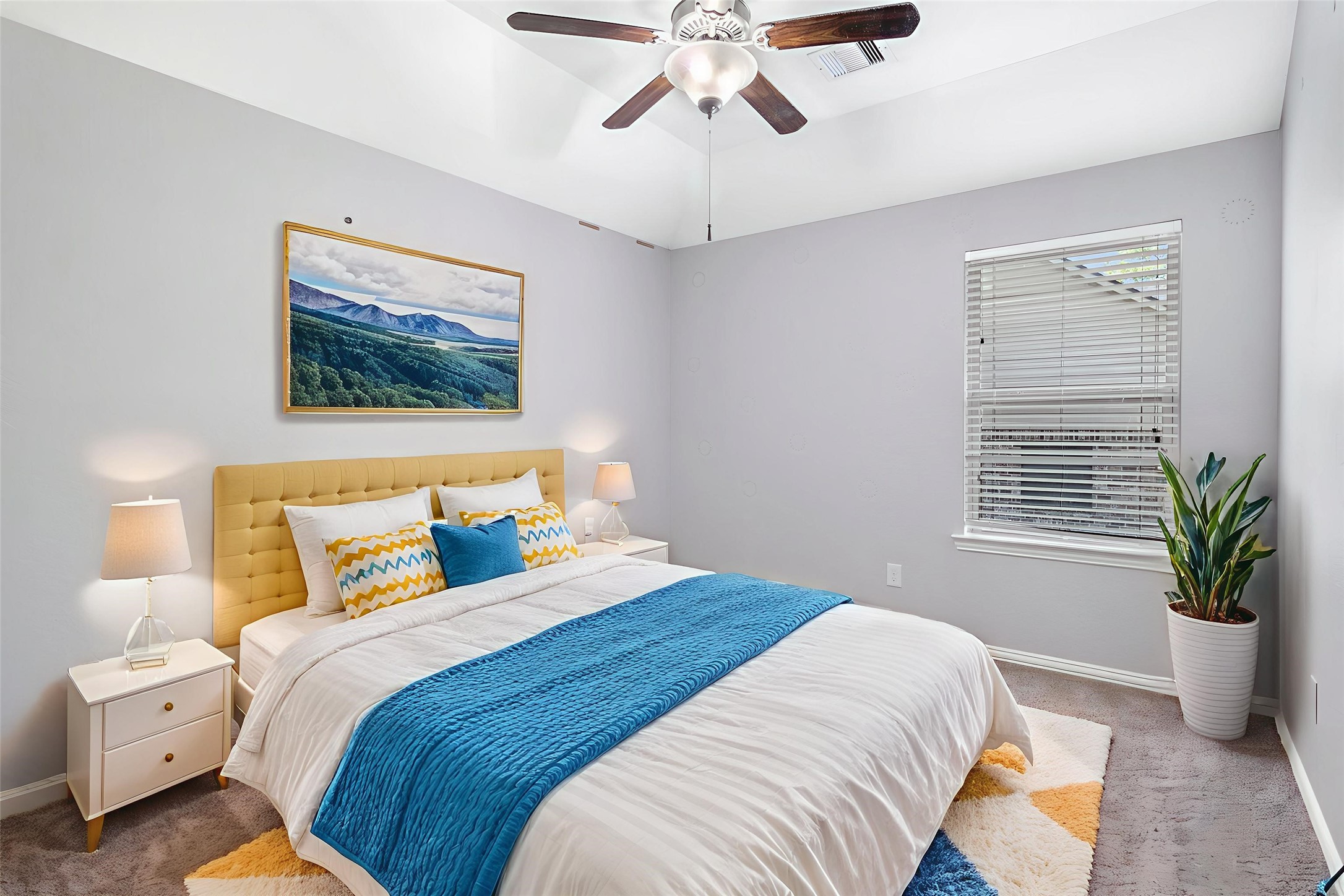 9014 San Saba Way Willis, TX 77378 - Photo 17 of 18 a bedroom with a bed and a painting on the wall