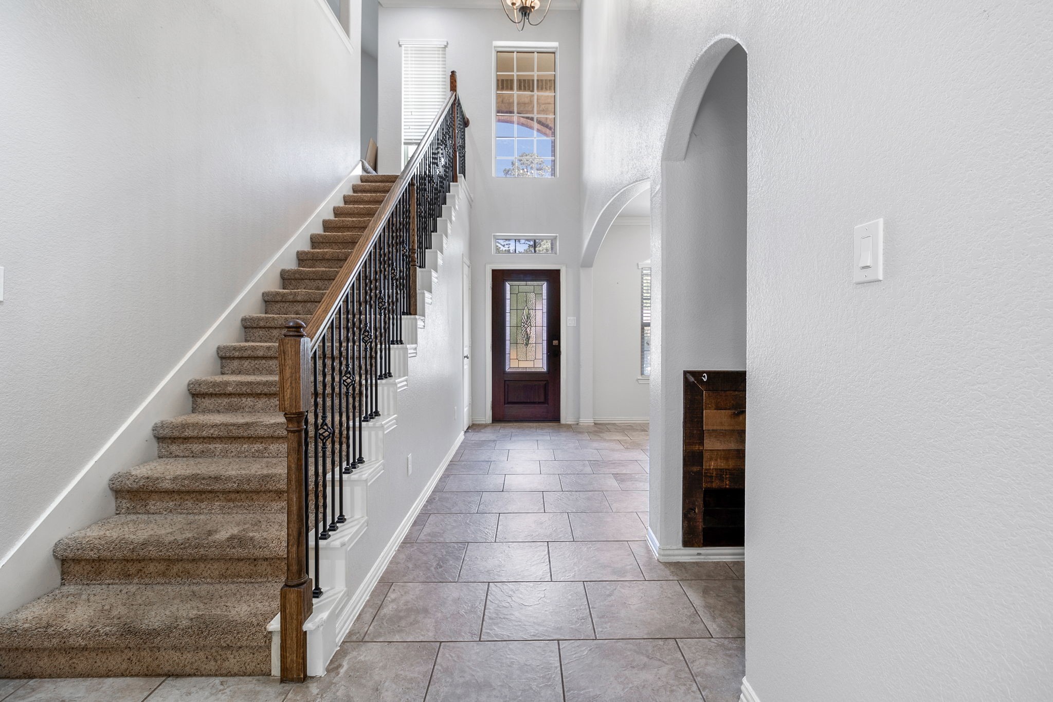 9014 San Saba Way Willis, TX 77378 - Photo 4 of 18 a view of staircase with white walls