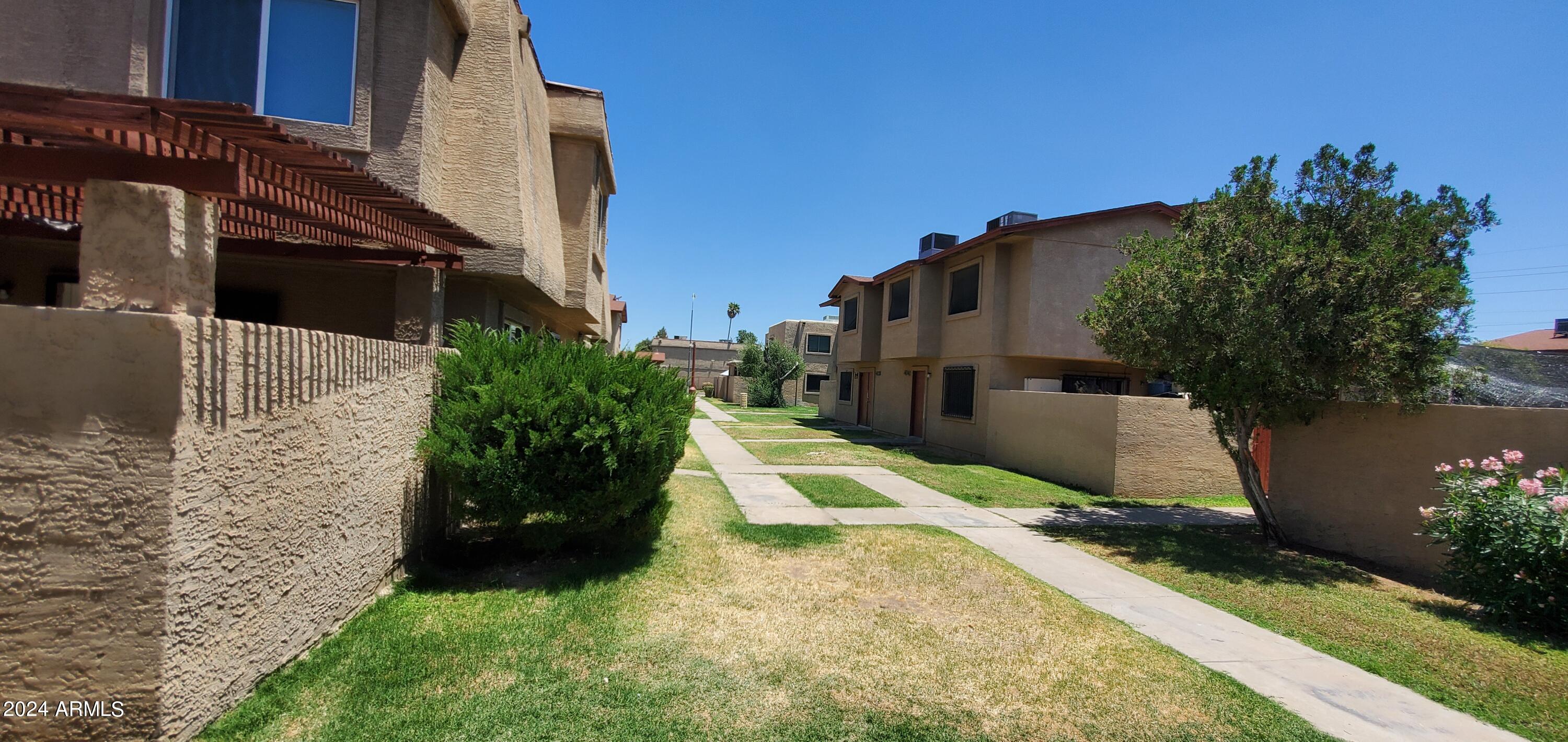 4010 West Wonderview Road Phoenix, AZ 85019 - Photo 1 of 9 a view of a back yard