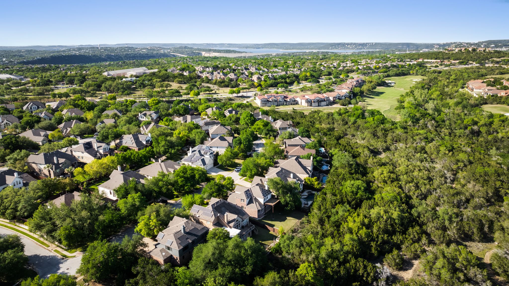 2708 Rio Mesa Drive Austin, TX 78732 - Photo 33 of 40 an aerial view of residential houses with outdoor space and trees