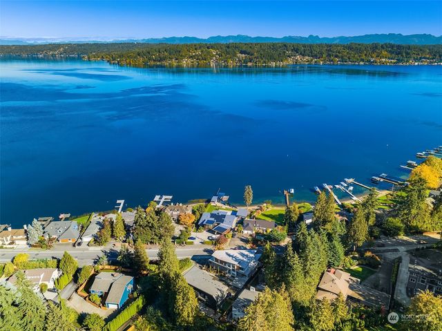 a view of a lake with a building in the background
