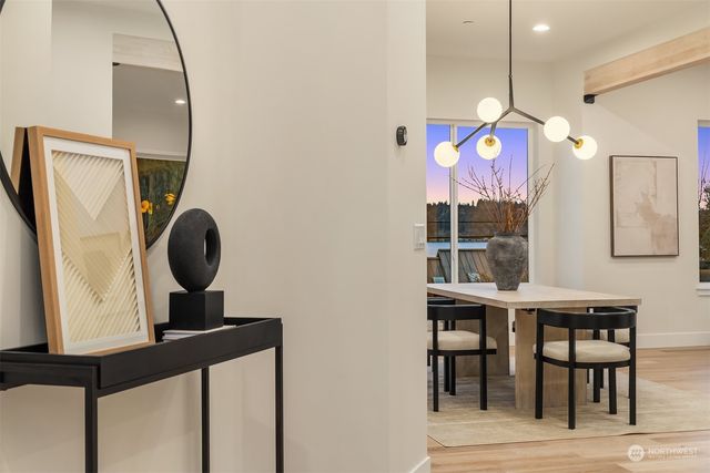 a kitchen with a table and chairs