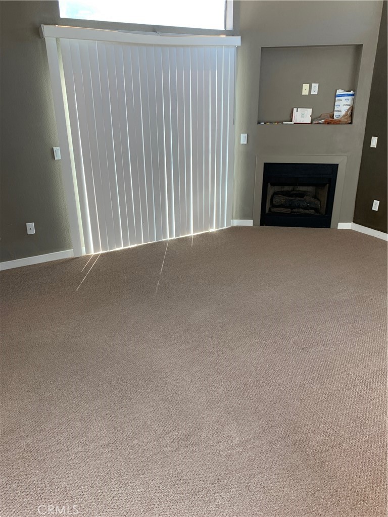 60055 Overture Drive Palm Springs, CA 92262 - Photo 13 of 19 a view of an empty room and a window