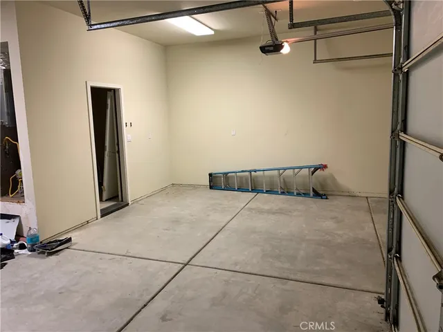 a view of a livingroom with a hallway