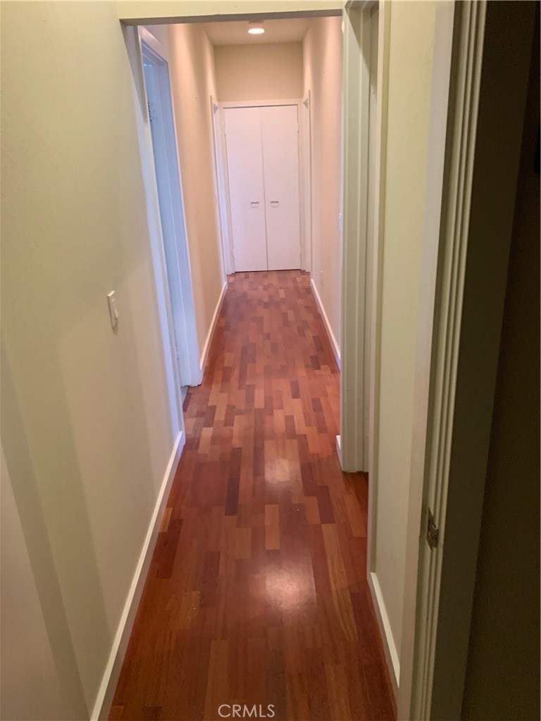 60055 Overture Drive Palm Springs, CA 92262 - Photo 6 of 19 a view of hallway with wooden floor