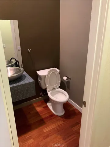 a bathroom with a toilet and a sink