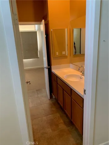 a bathroom with a tub and sink