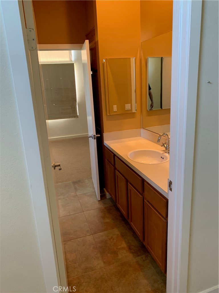 60055 Overture Drive Palm Springs, CA 92262 - Photo 10 of 19 a bathroom with a tub and sink