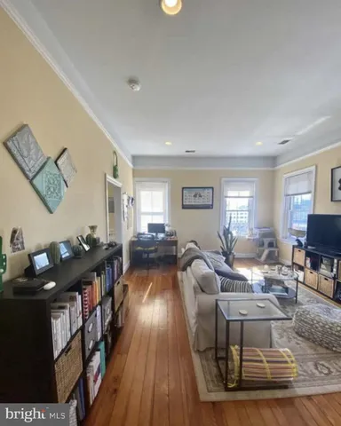 a workspace with furniture and a window