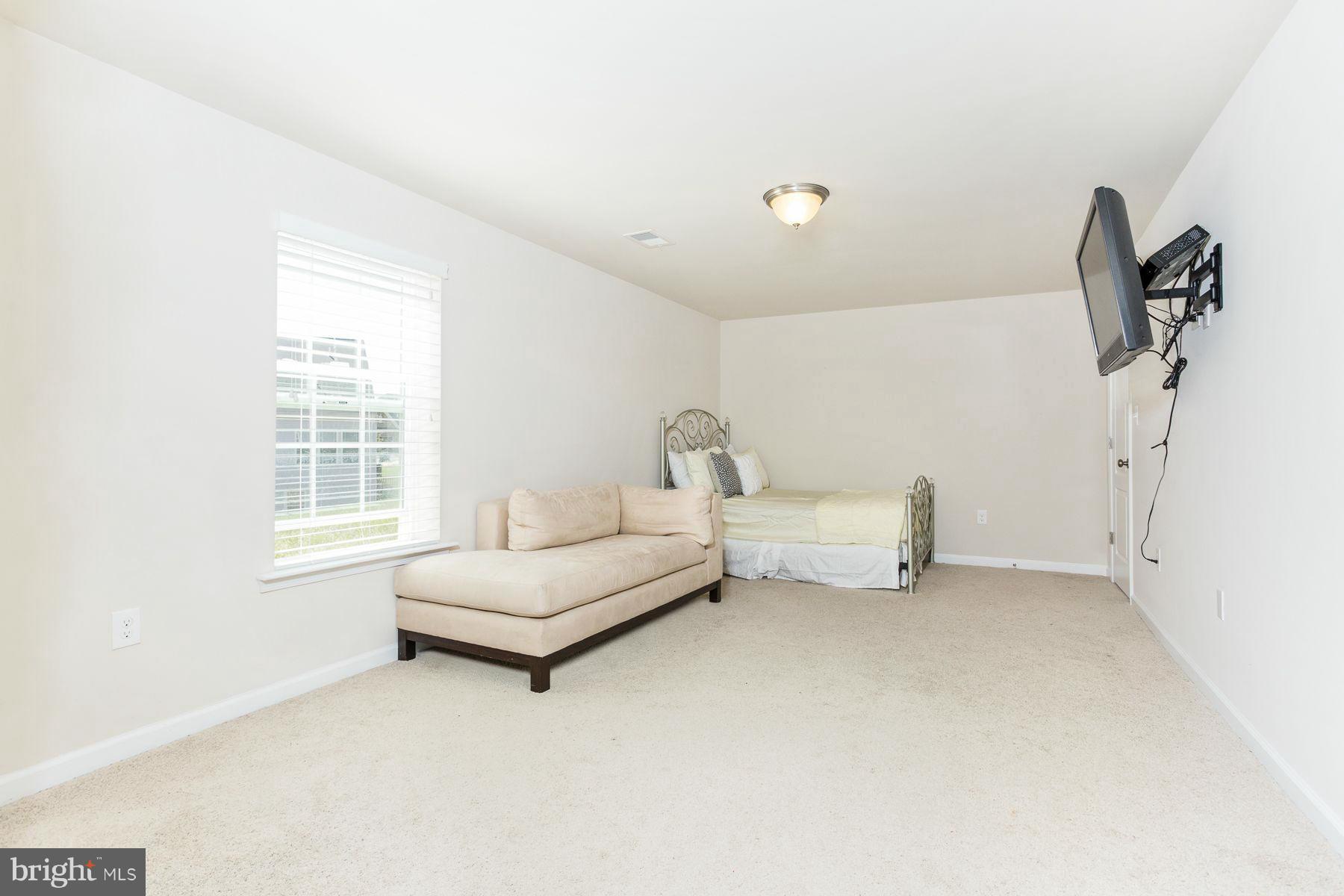 23 Tankard Road Stafford, VA 22554 - Photo 22 of 29 a living room with furniture and a window