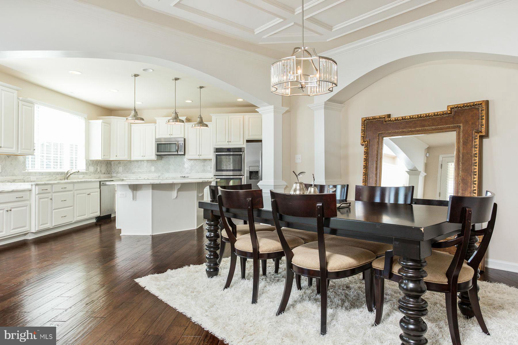 23 Tankard Road Stafford, VA 22554 - Photo 7 of 29 a view of a dining room with furniture and wooden floor