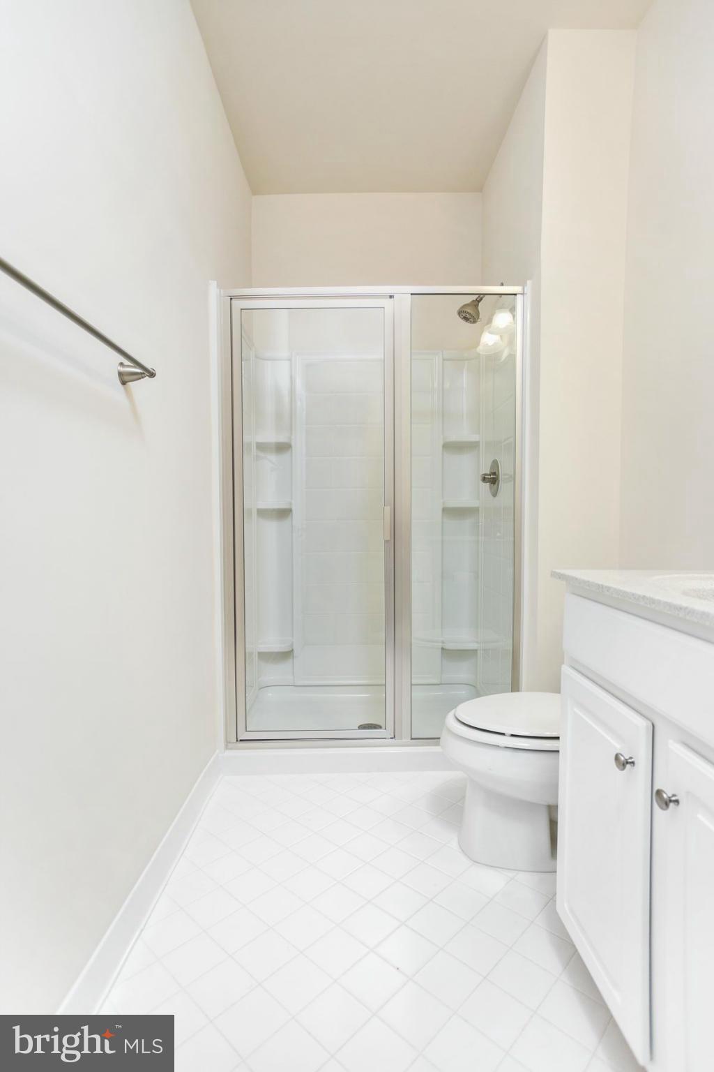 23 Tankard Road Stafford, VA 22554 - Photo 9 of 29 a bathroom with a toilet a shower and a sink