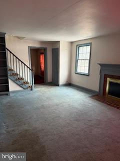 493 Wheatsheaf Road Springfield, PA 19064 - Photo 4 of 25 a view of empty room with a fireplace