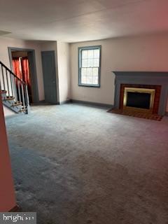 493 Wheatsheaf Road Springfield, PA 19064 - Photo 5 of 25 a view of an empty room with a fireplace